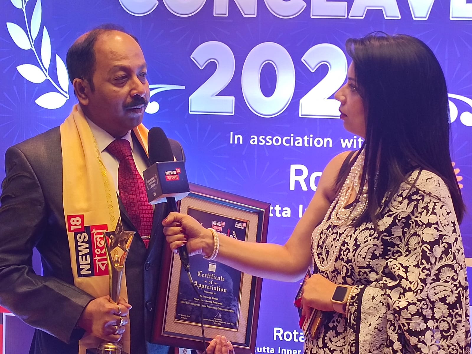 Chiranjib Ghosh receiving an award recognition